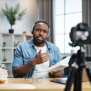 African american man doing live stream at home