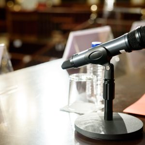 Microphone in conference room to communicate to the audience a business speech.
